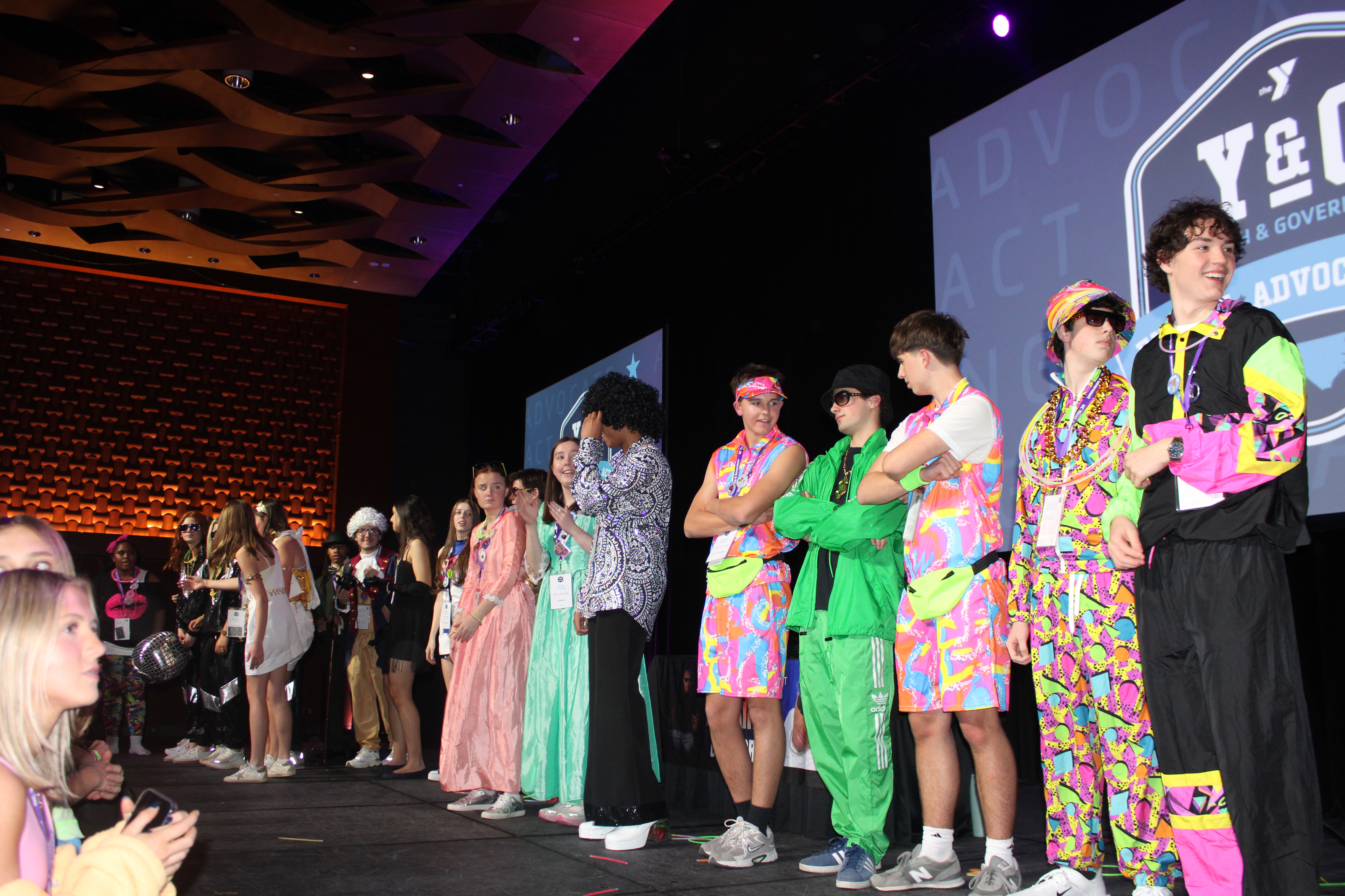 Decades-Themed Costumes, Black Light Bingo and Karaoke: A Recap of Friday Fun Night
