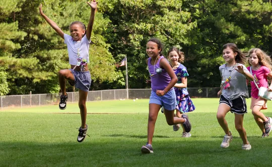 Group of girls running outside