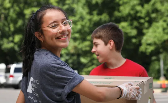 Teens working a food drive