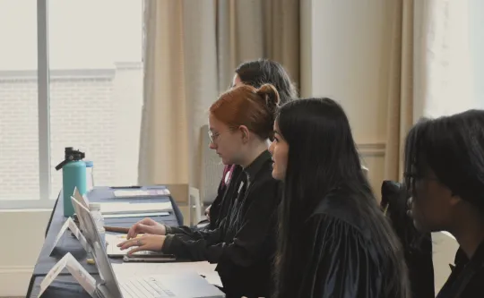 students in judicial robes