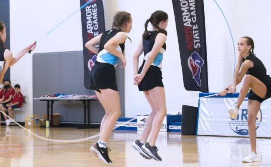 Four girls in a jump rope competition