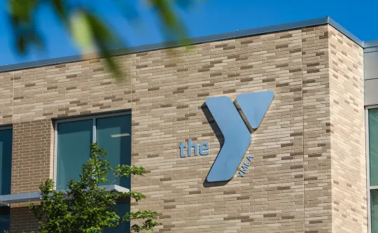 Logo on the Southeast Raleigh YMCA building