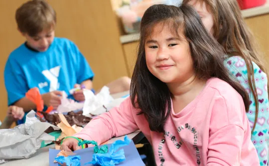 Girl with her art project