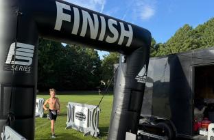 Finley Frenzy Youth Triathlon participant finishes the 2025 race