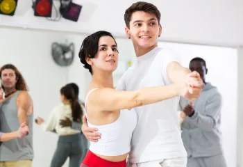 Couple taking a ballroom dance class
