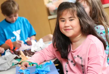 Girl with her art project