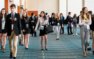 Teenagers walking in a room