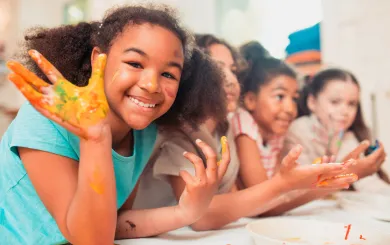 Kids enjoying a finger paint craft