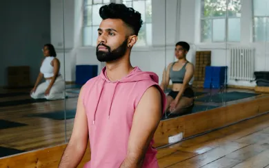 Male focused shot in a yoga position 