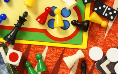 Colorful assortment of board game pieces 