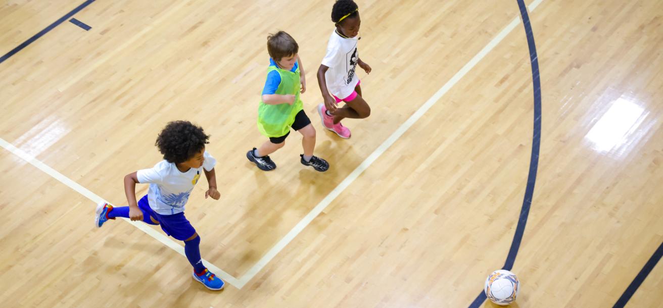 Group of kids practicing soccer drills