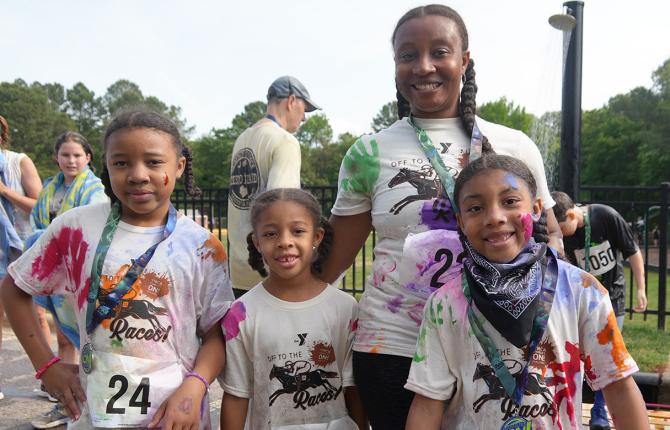 Family celebrating their finish at the Families On! race