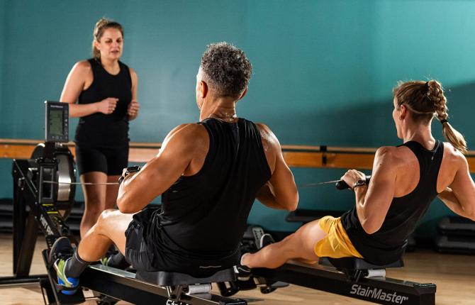 YMCA members on a rowers during a fitness class